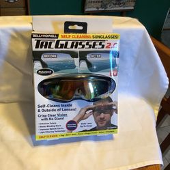 Bell & Howell Tac Glasses 2.0 brand new in box won as a raffle. Polarized, self cleans inside and out Never worn only out of the box for pictures