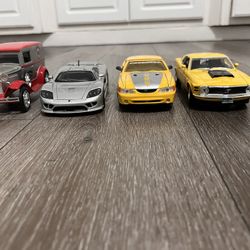 Diecast Cars 1/24 Scale Lot Of 4 Cars 20 Dollars For All Of Them 