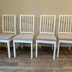 4 White Wooden Chairs With attached padding