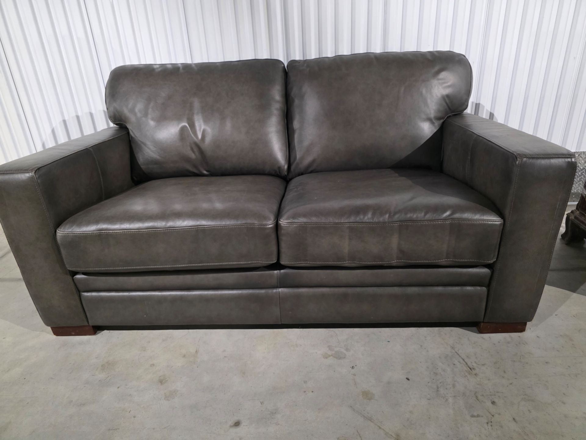 Dark gray, leather couch