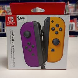 Nintendo Switch Joycons Purple/ Orange New