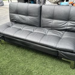 Black Leather Futon/Lounger w/plug