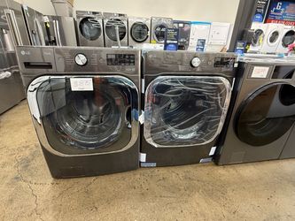 New open box LG jumbo Charcoal stainless steel washer and electric 220 volts dryer set