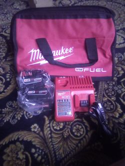  (2)  Milwaukee 5.0 Battery And  Rapid Charger Starter Kit