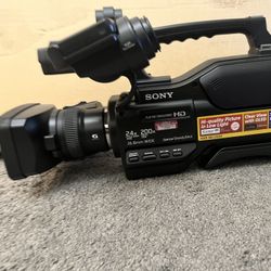 Sony HXR-MC2500 Professional Camcorder + Lighting Kit + Batteries + Stands + 3 Carrying Cases