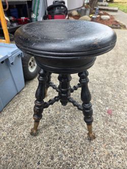 Antique claw foot piano stool
