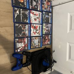 PS4 (good Condition) 2 Controllers, 12 Games, Mic