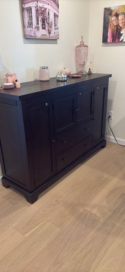 Beautiful buffet with wine bottle storage