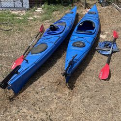 Two Perception Sea Kayaks