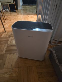 Air filter purifier with spare filters.