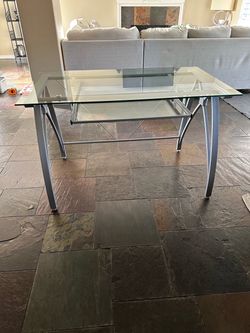 Glass desk w/ pull out keyboard.