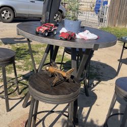 Tall Table W/4 Swivel Stools 