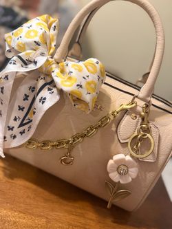 Coach medium Rowan in oat color