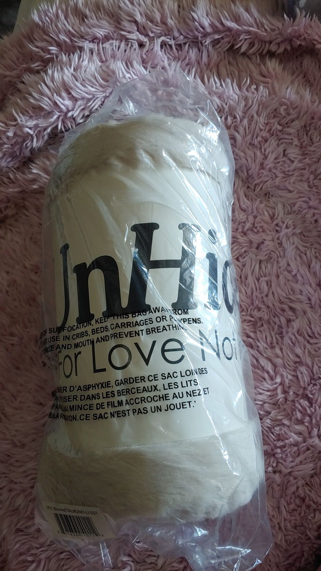 UnHide faux fur blanket