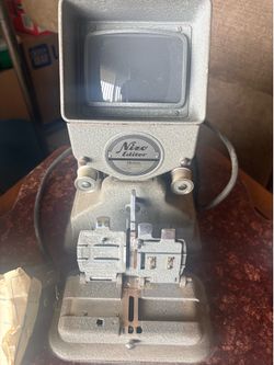 Vintage Nizo Editor 8mm and 16mm tabletop film editing console.