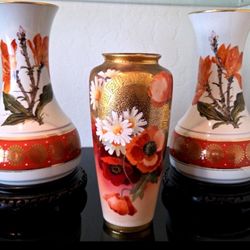 Porcelain vase set with hand-painted floral designs and gold gilt decoration