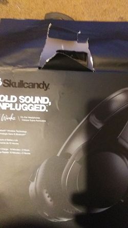 Brand new wireless skull candy headphones come with charger