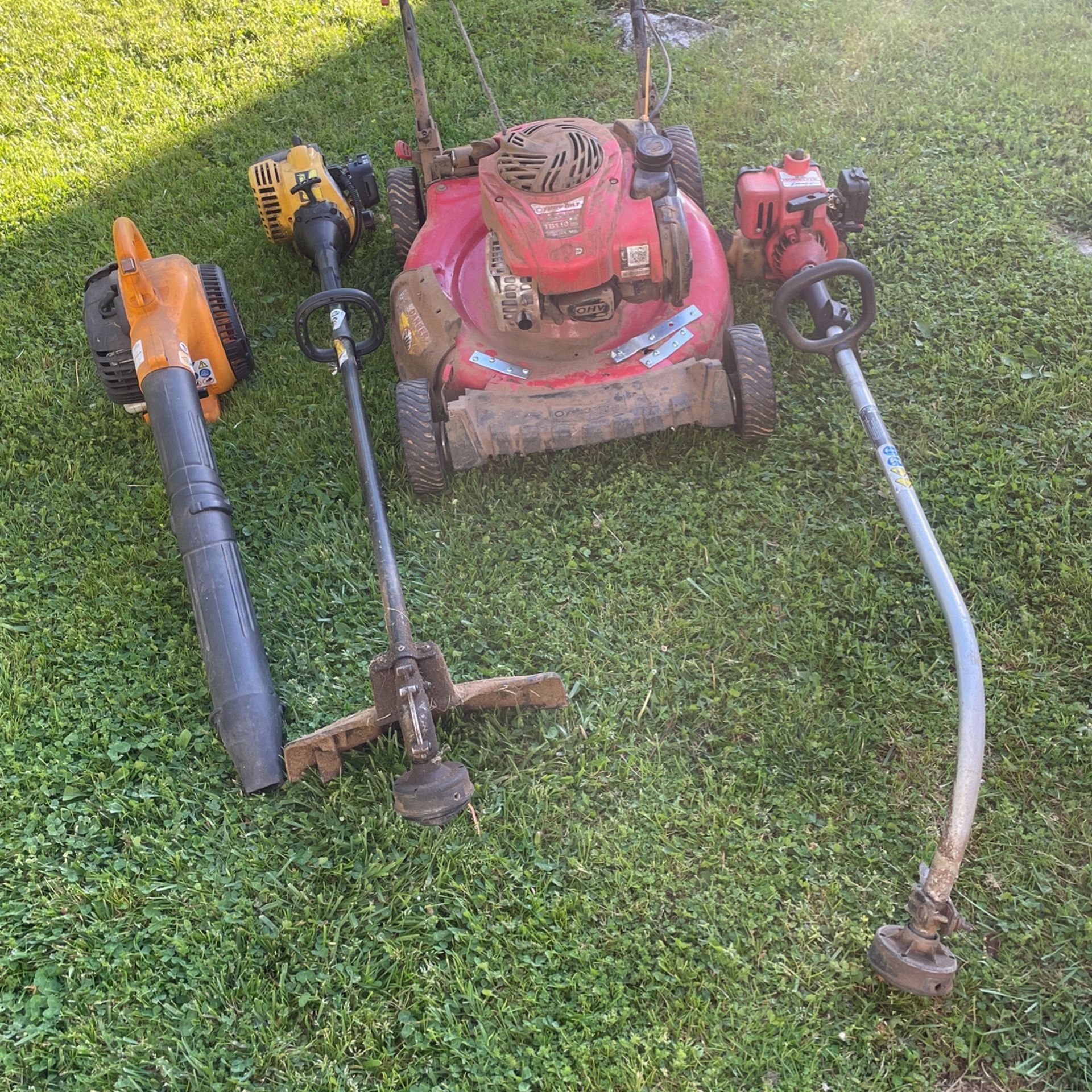 Push mower two weedeaters one blower everything $25