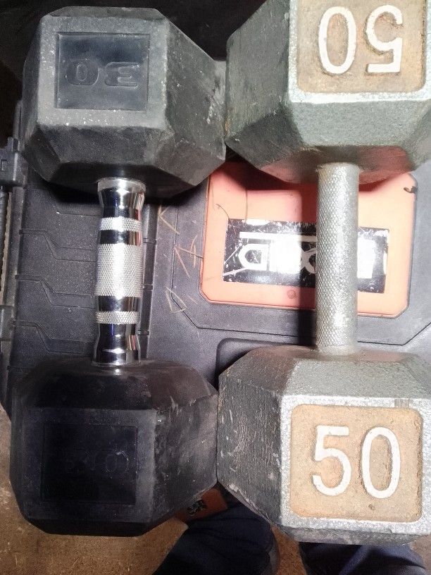 Dumbbell 50  And 30 Pounders One Each