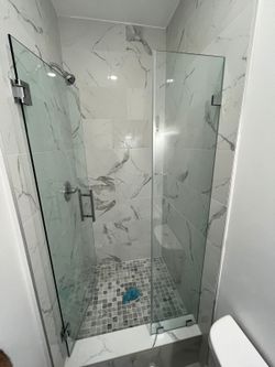 Local frameless shower door enclosures