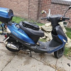 Slightly Broken Motor Scooter