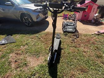 1200 watt electric scooter works great no issues comes with wagon