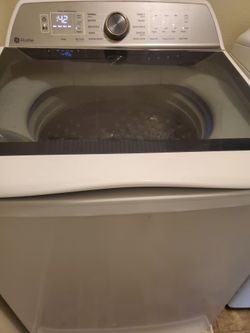 3 year old GE profile washer works great delivery Available