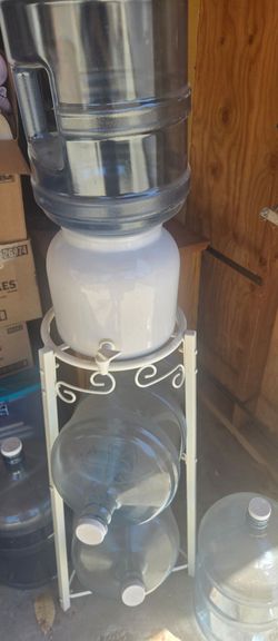 Glass water dispenser and five 5 gallon bottles