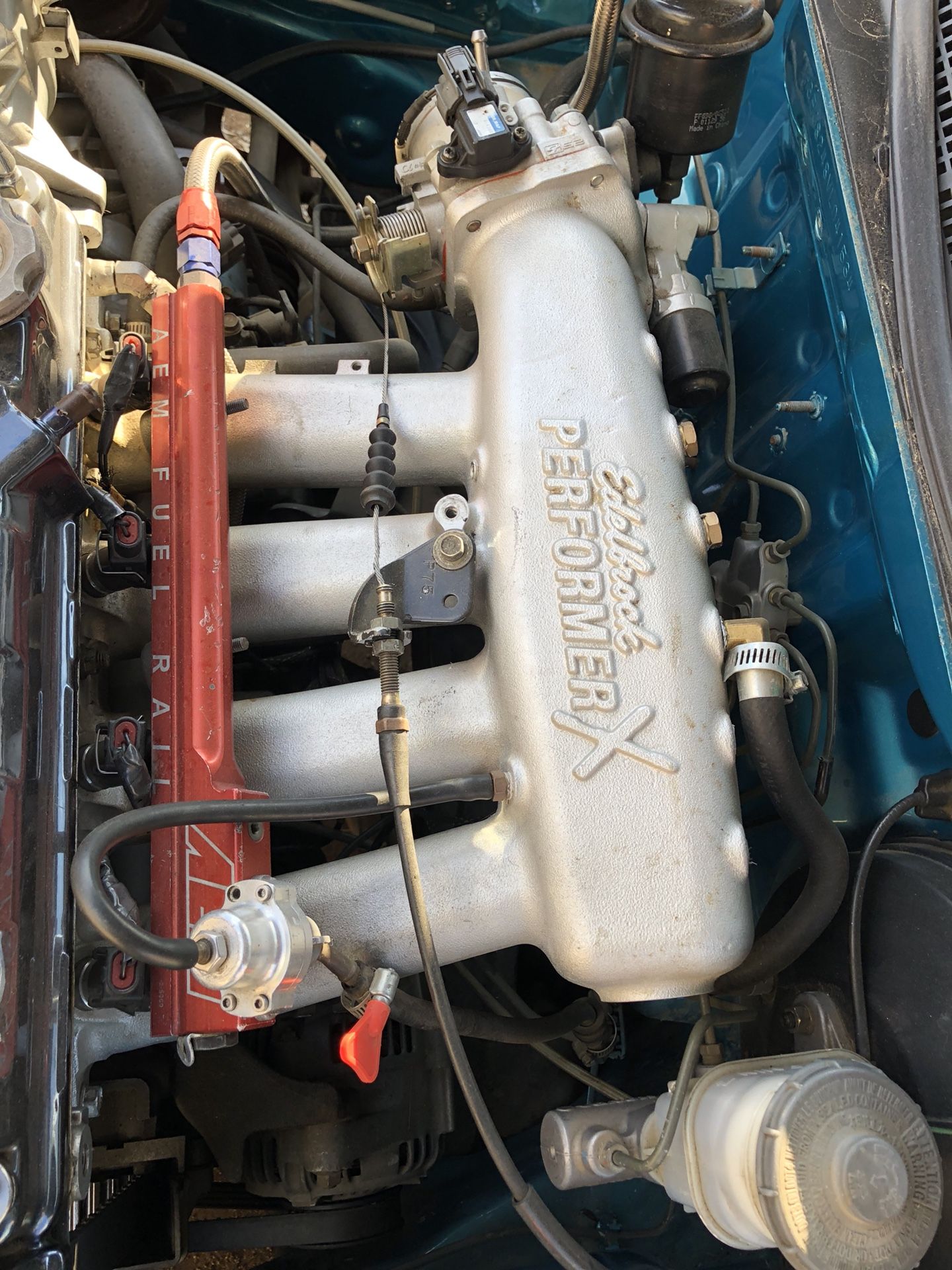 B18c1 gsr intake manifold (edelbrock performer x) with skunk 2 tb aem fuel rail