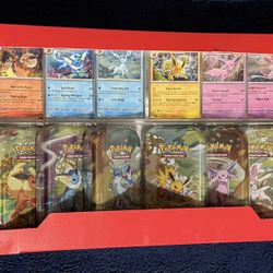 Prismatic Evolution Costco Mini Tins