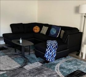 Black L-Shaped Sectional Couch w/ Ottoman – Excellent Condition – Must Go Today