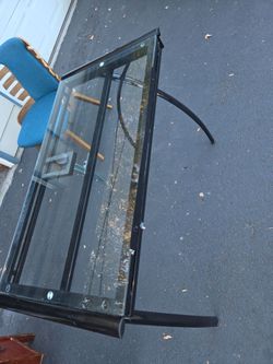 This is a glass top drafting table