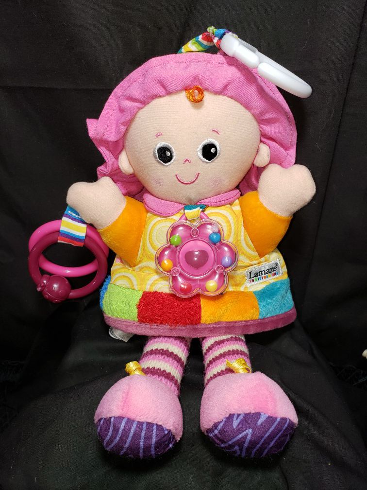 Lamaze Doll baby activity toy . Rattles , crinkles , rings and clip to hook to stroller or anywhere