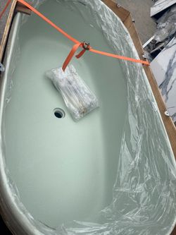 53 x 7x 28 in solid surface freestanding tub