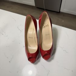 Authentic Christian Louboutin heels in iconic red patent leather Size 37