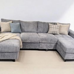 Brand new grey fur like corduroy Sectional Sofa with double chaise and two accent pillows.