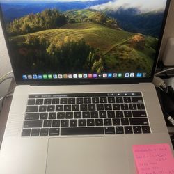 MacBook Pro 2018 15” Touch Bar Retina Intel 6 Core i7 8th Gen@ 2.2GHz,32gb Ram, 512gb  SSD, Radeon Pro 555X 4GB Graphics. macOS Catalina. Very Good Ba