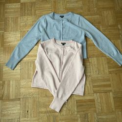 light blue and light pink cardigans 