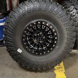 15” Hostile Jackal H201 blade cut (5x114) with 35” EFX Motorally Tires set
