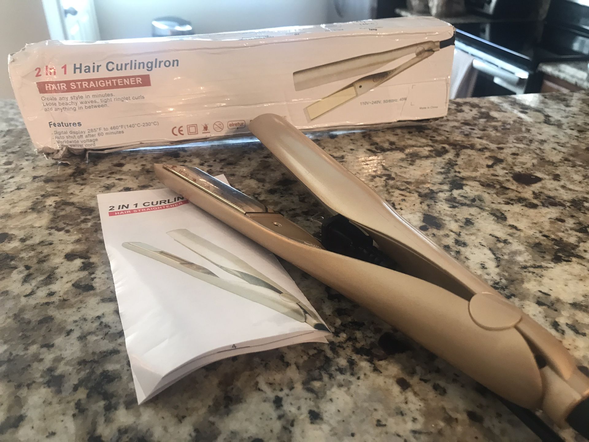 straightener/curler brand new. Never used