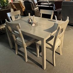 Table And 4 Chairs 