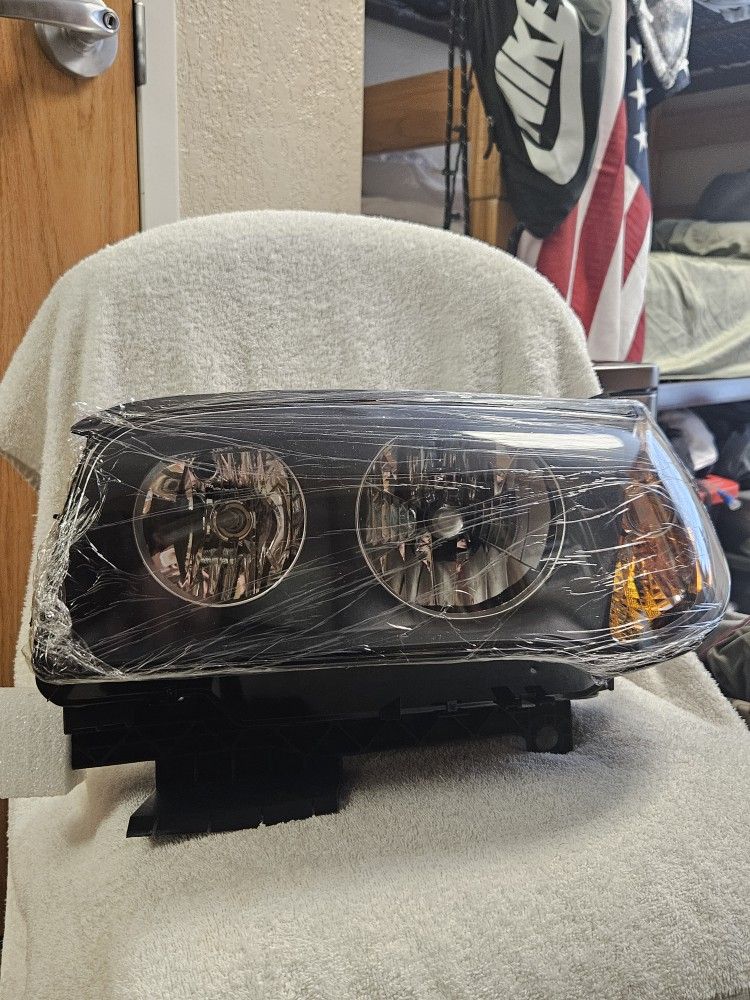 BMW X3 E83 Headlight