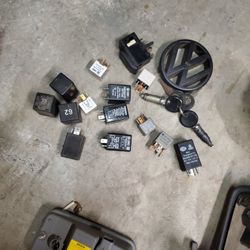 Assortment Of Volkswagon VW MK2 Hella Tridon Switches, Relays, Emblem, And Keys