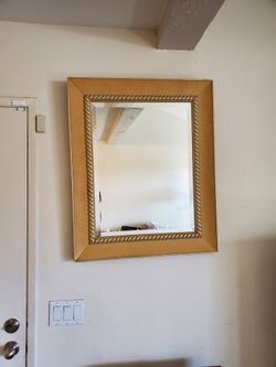 Beautiful wooden gold wall mirror
