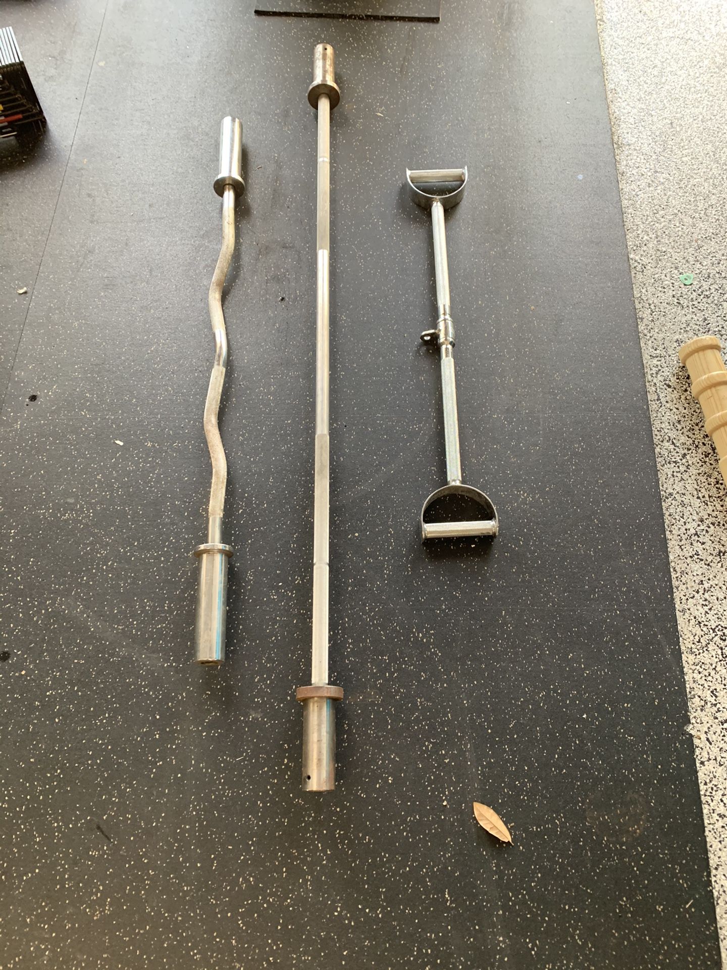 Various weightlifting bars for sale. Some light weight Rogue barbells too