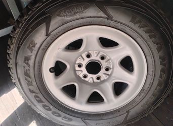 (TWO) Durable Goodyear Wrangler all-terrain tires  LT265/70R17