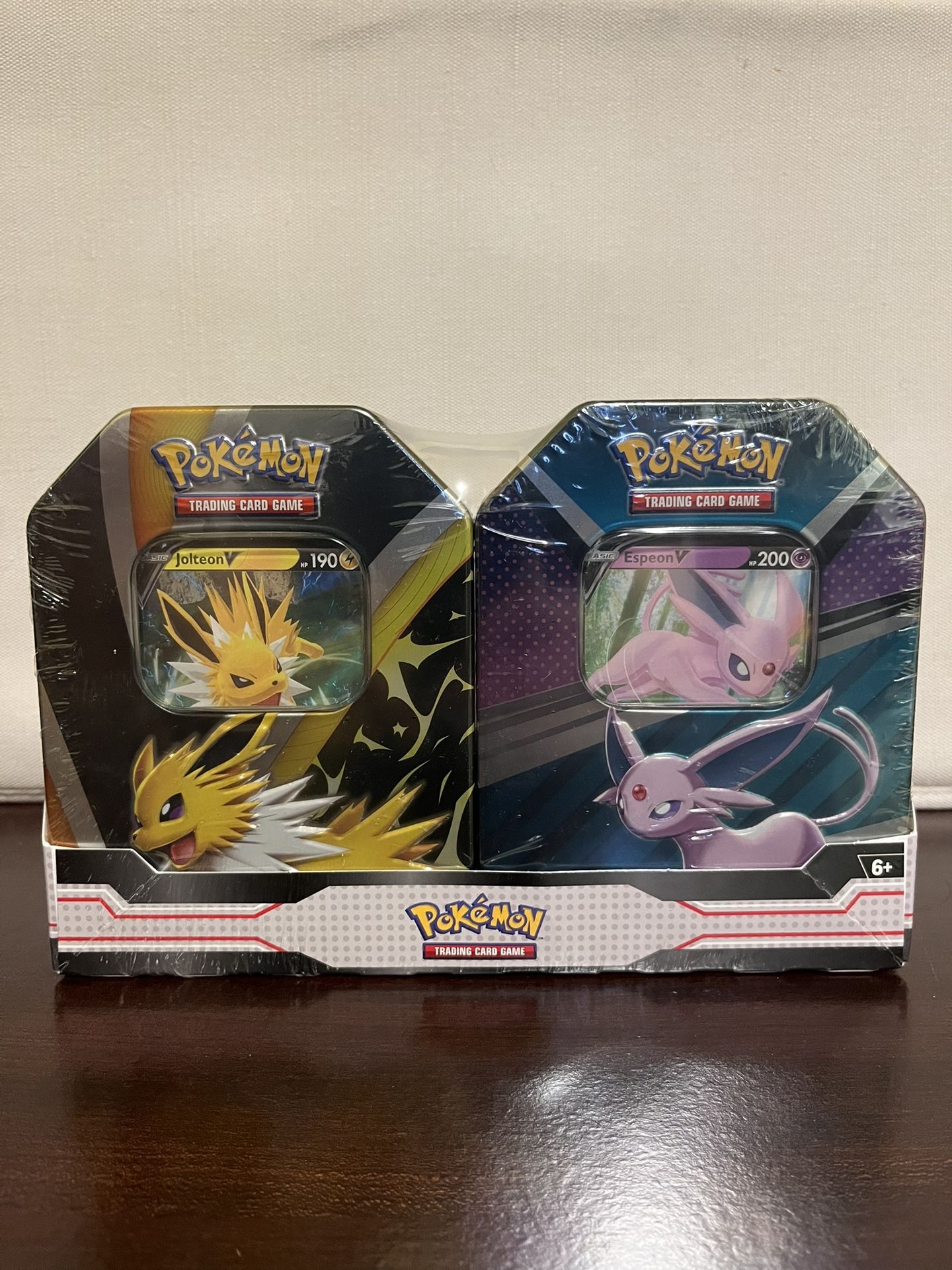 Jolteon and espeon tin