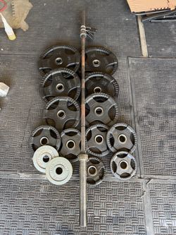 Body solid rubber weights 265lbs total plus 7ft 45lbs bar