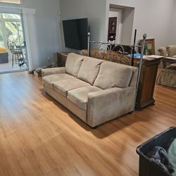 3 Seat Tan Couch With Hide-bed