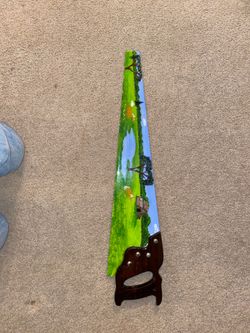 Beautiful hand painted antique saw